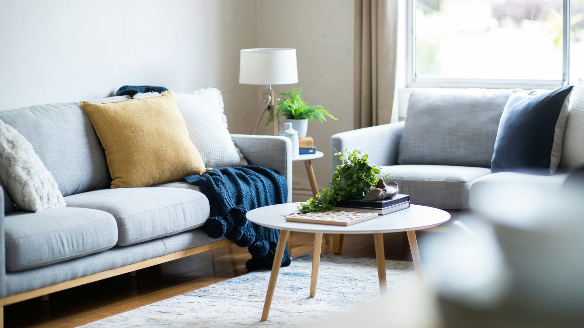 a living room with a couch and a coffee table